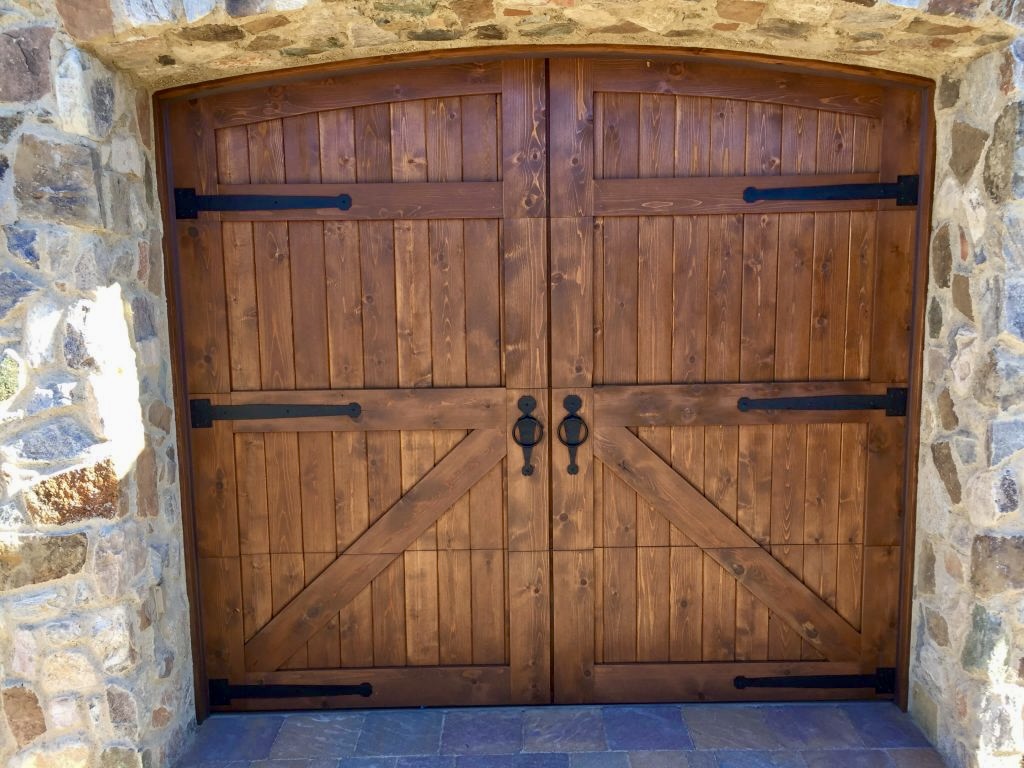 custom wood garage doors with carriage brackets